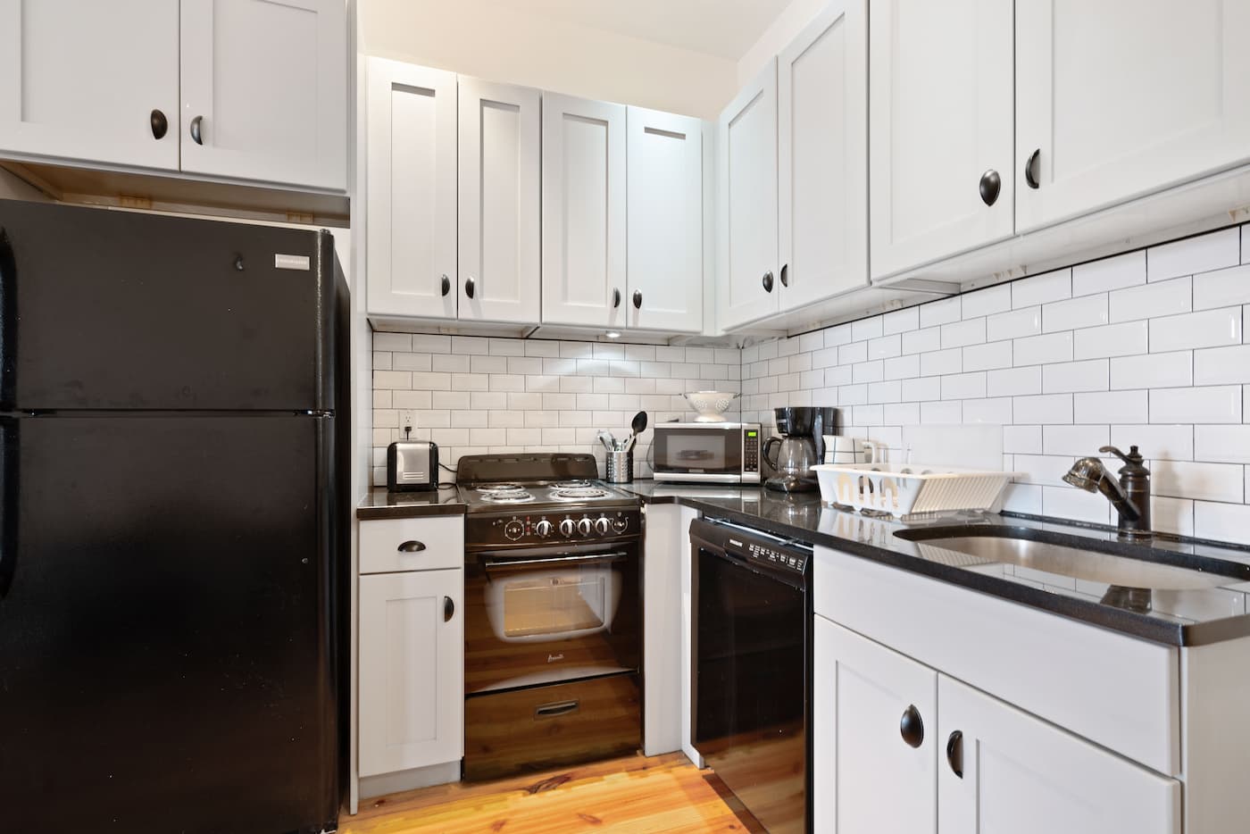 The Kitchens/Dining Room at The Upper Manhattan House (Image 1)