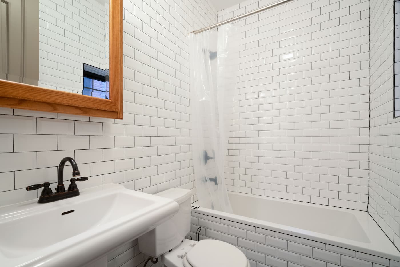 The Bathrooms at The Upper Manhattan House (Image 1)